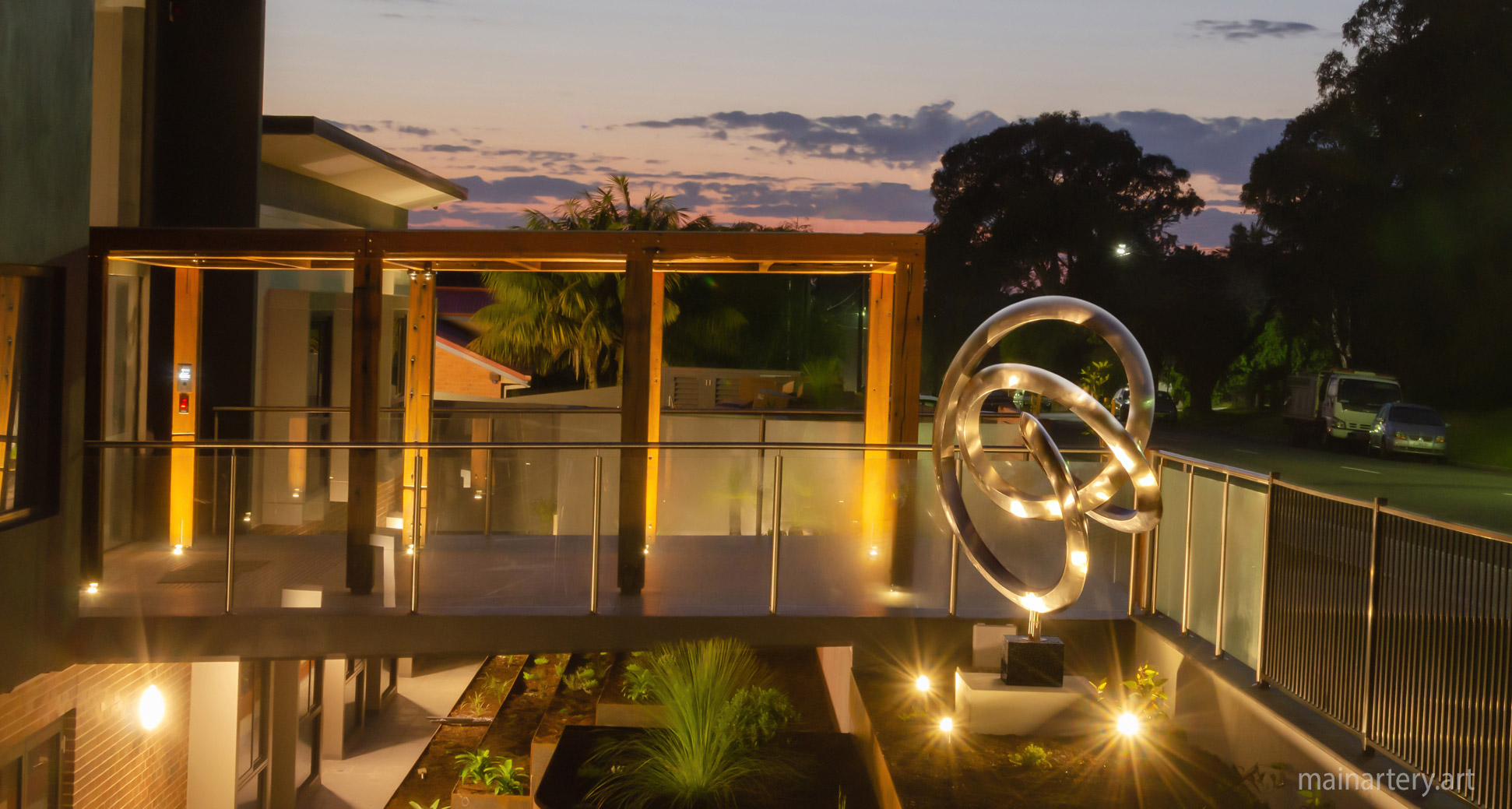 large polished abstract double tied public sculpture image