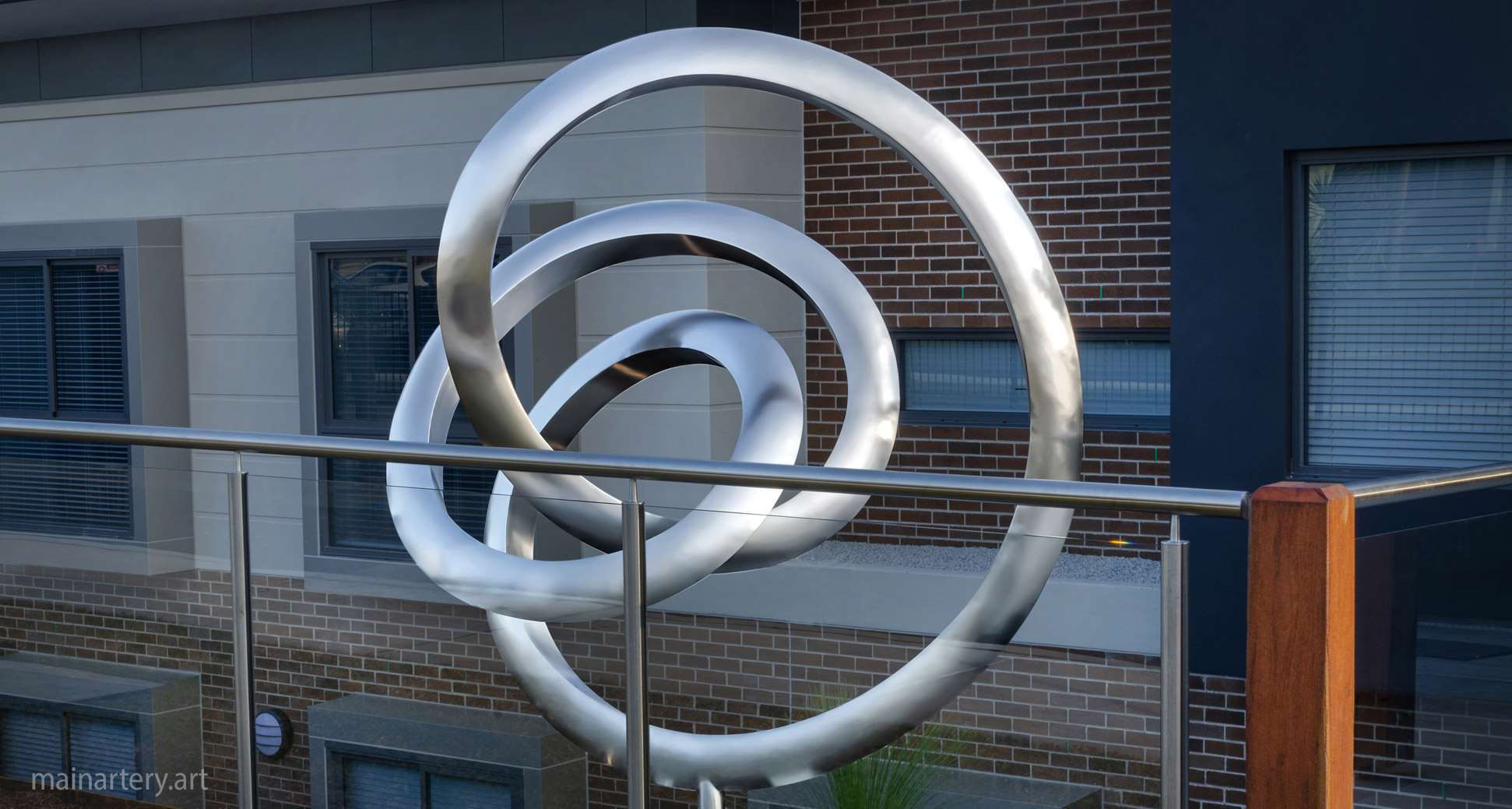 courtyard mirror polished contemporary landmark sculpture image