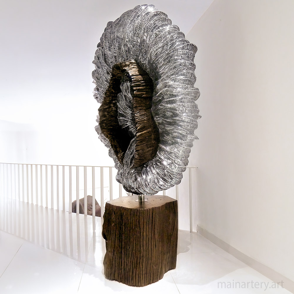 Cover: Cyclops Round Stainless Sculptures