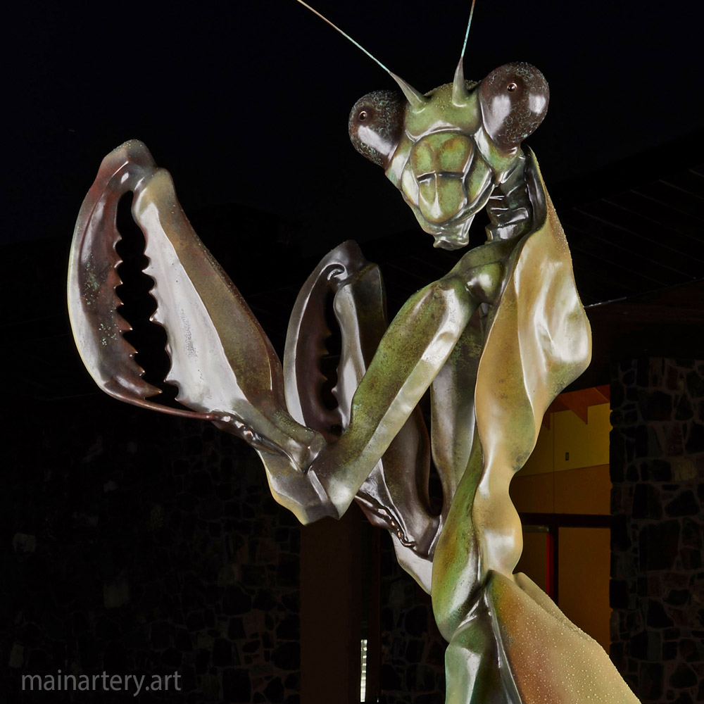 Cover: Praying Mantis Golden Sculpture