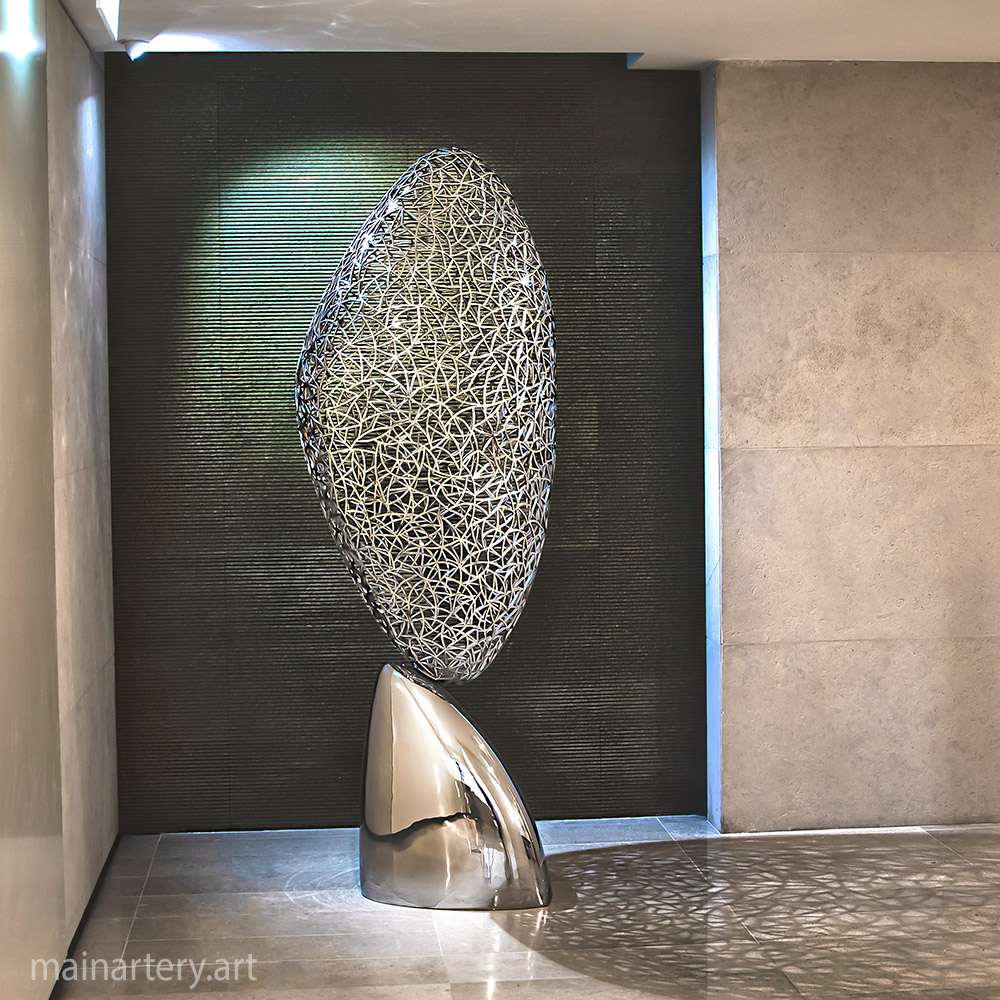 Cover: Stainless Steel and Stone Sculptures