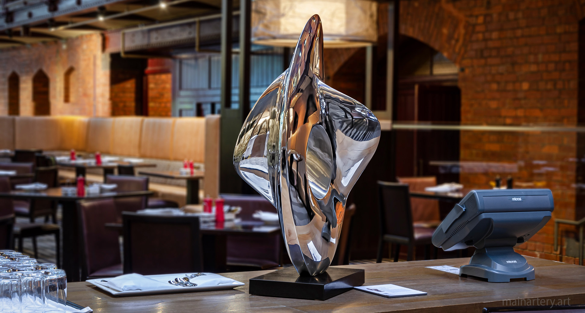 small stainless abstract interior sculpture intercontinental image