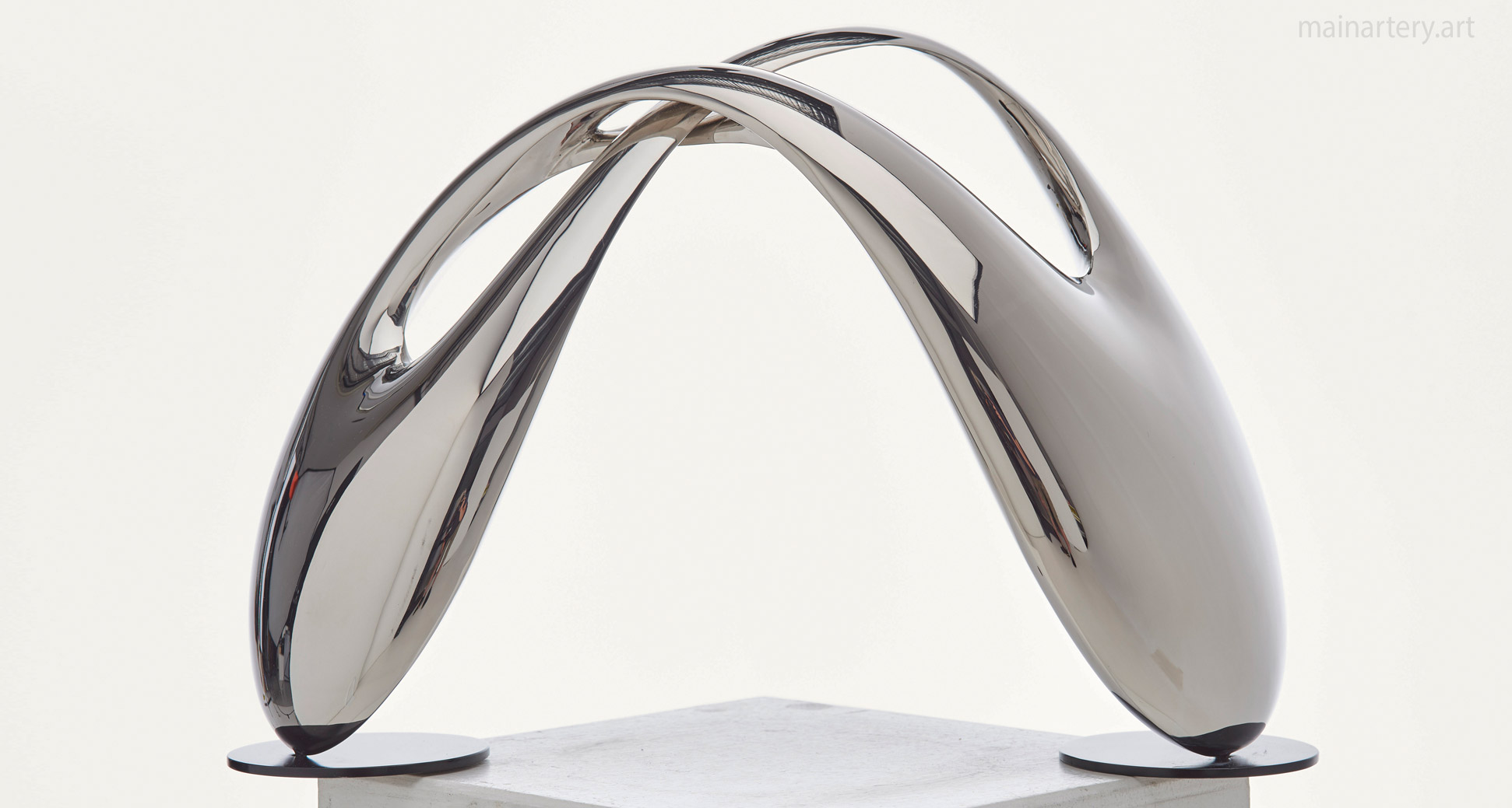 tabletop polished infinity interior sculpture image