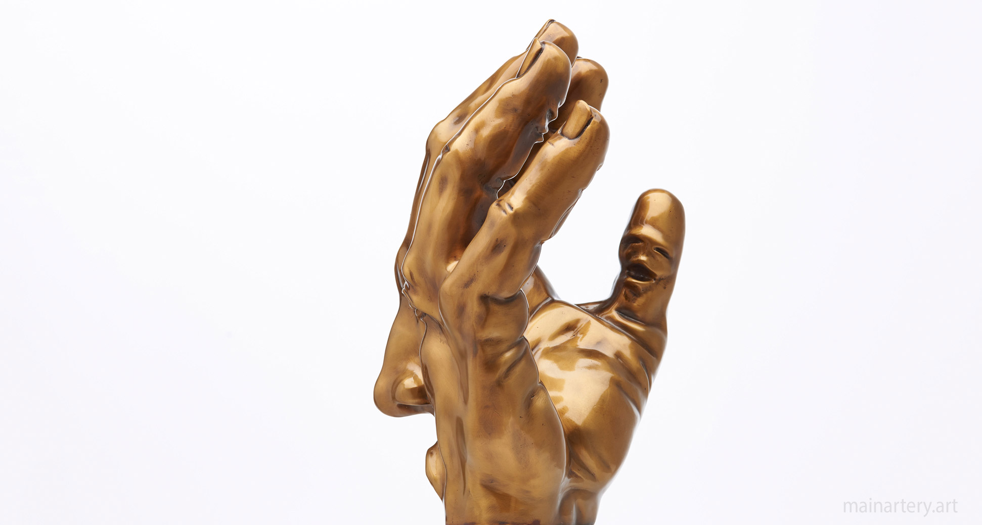 interior polished bronze contemporary hand sculpture image