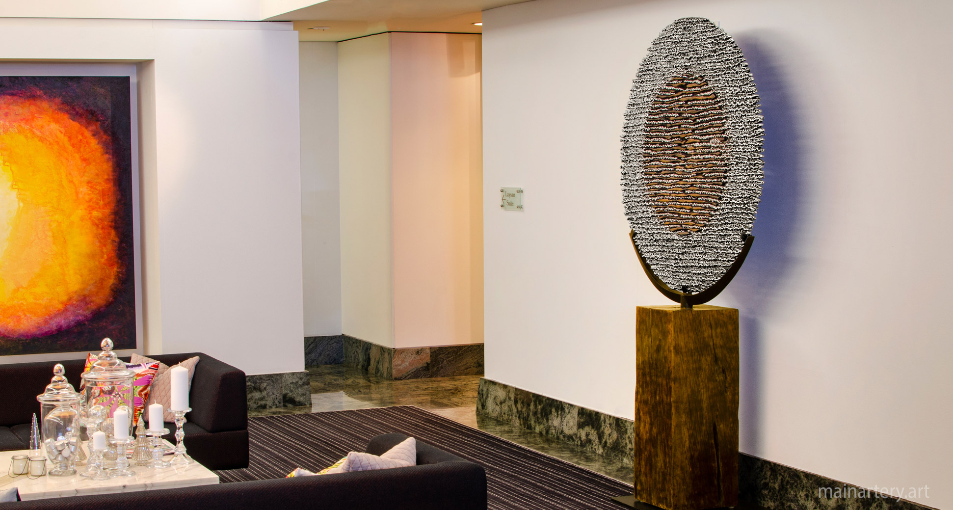 large stainless steel circular rental artwork image