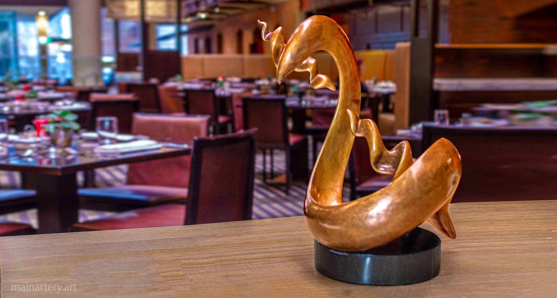 tabletop bronze representational sculpture image