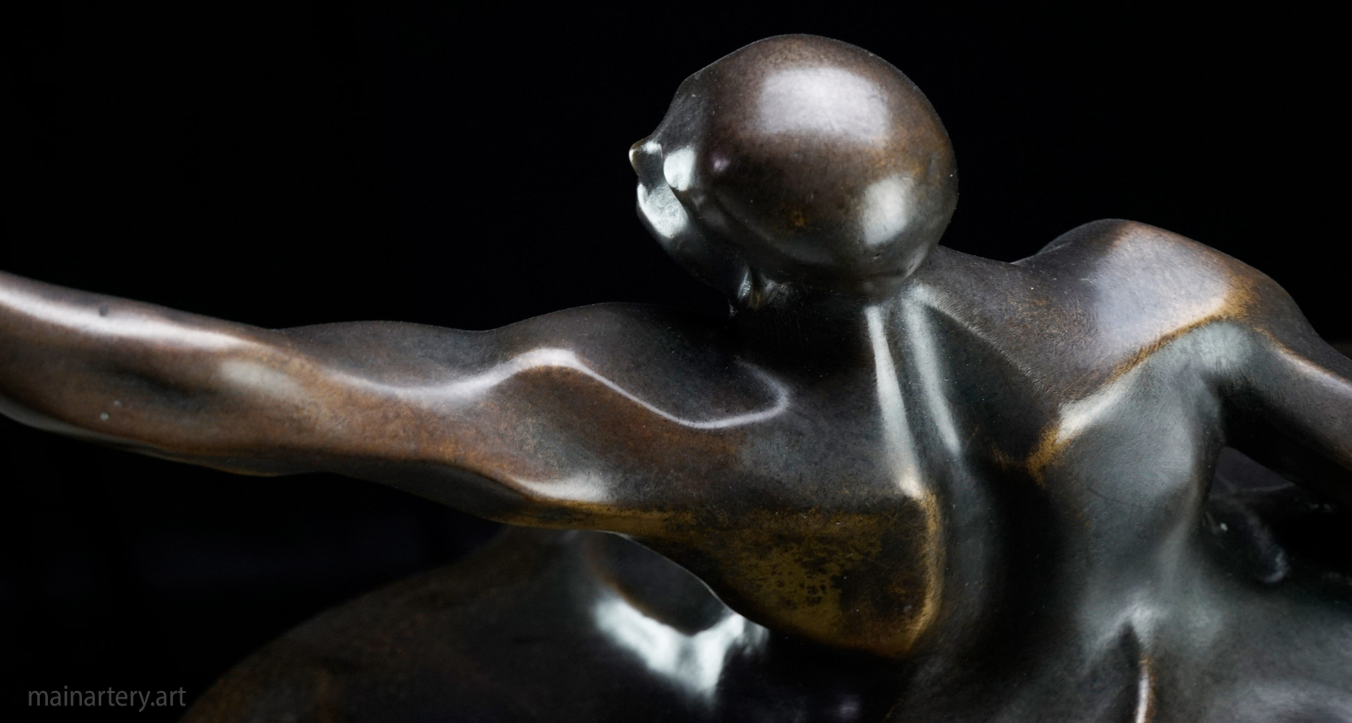 tabletop multi patina man reaching interior artwork image