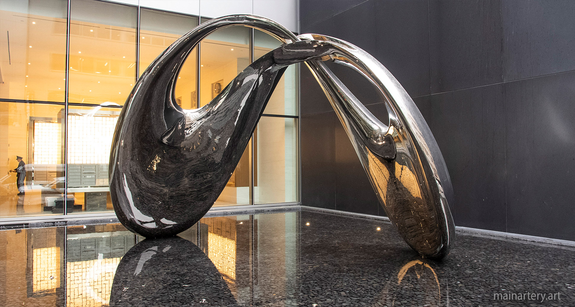 Building Facade Mirror Polished Organic Architectural Sculpture, a reflection of innovative urban aesthetics