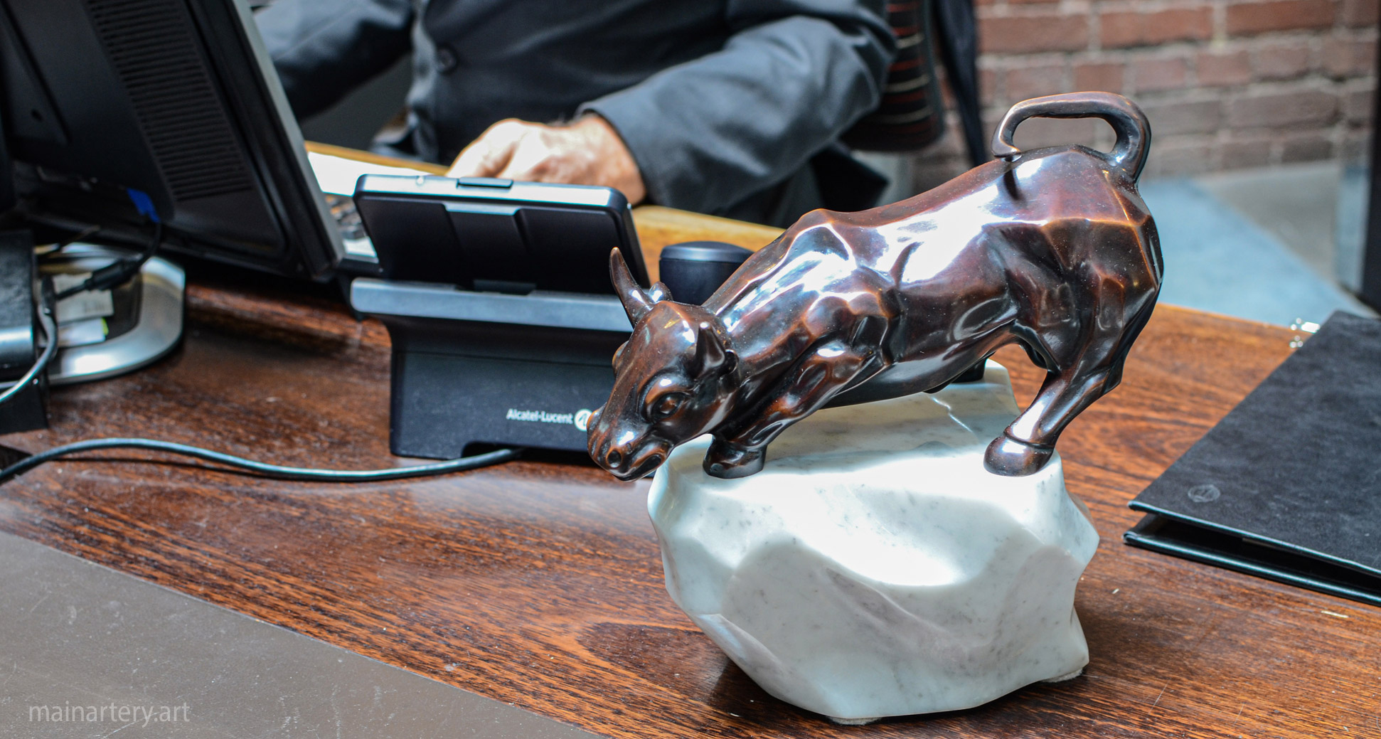 interior polished bronze bull art image