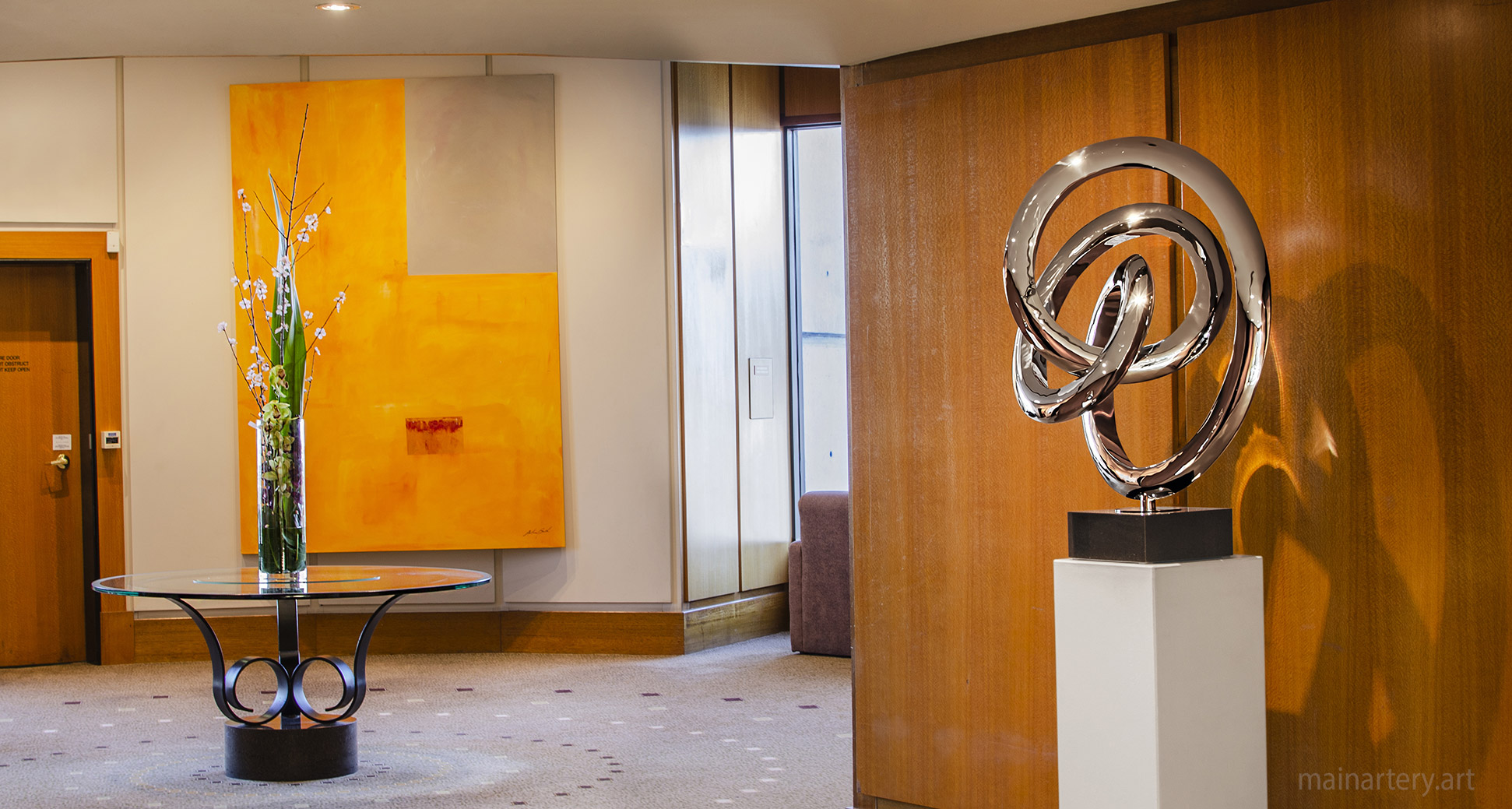 medium stainless double tied spherical art image
