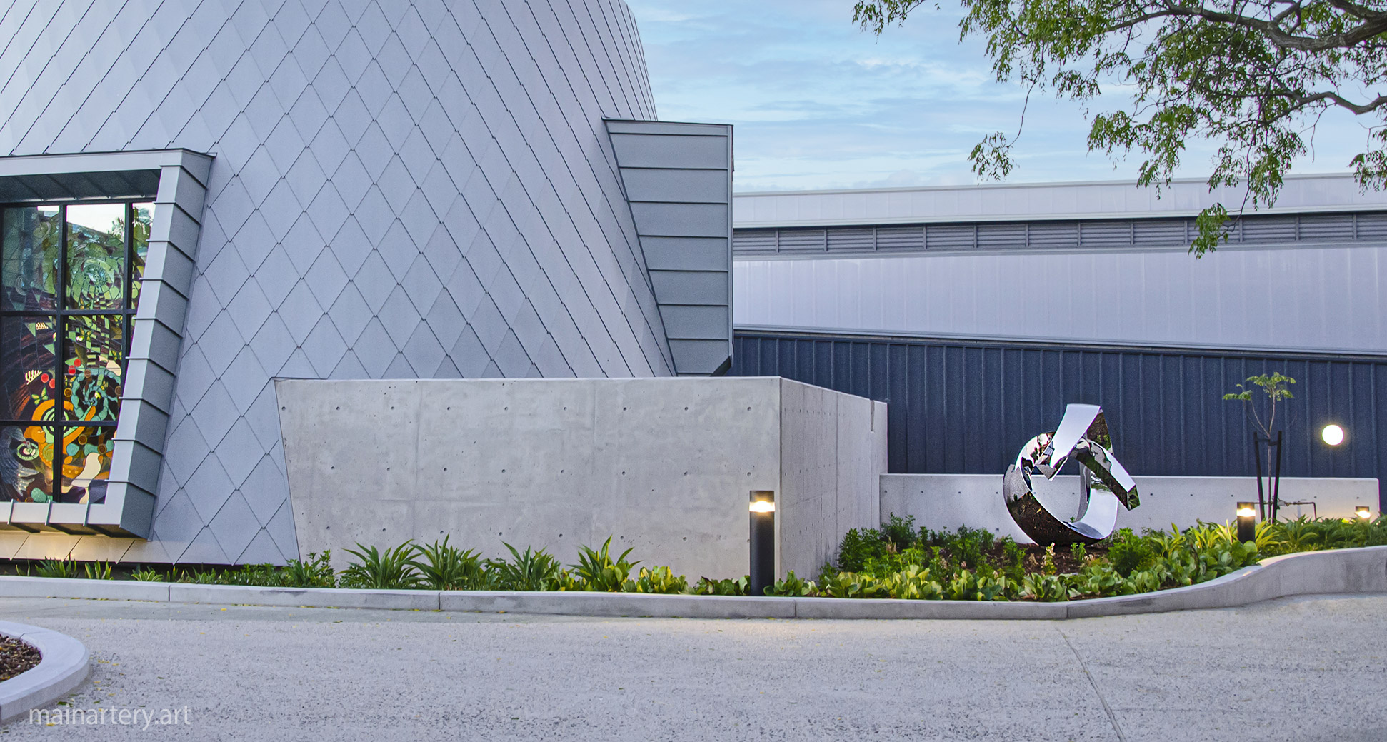 polished abstract school entrance sculpture image