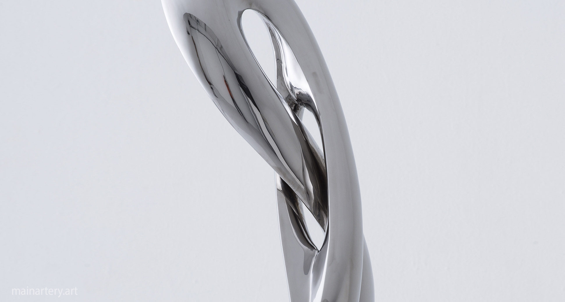large stainless steel organic forms totem sculpture image
