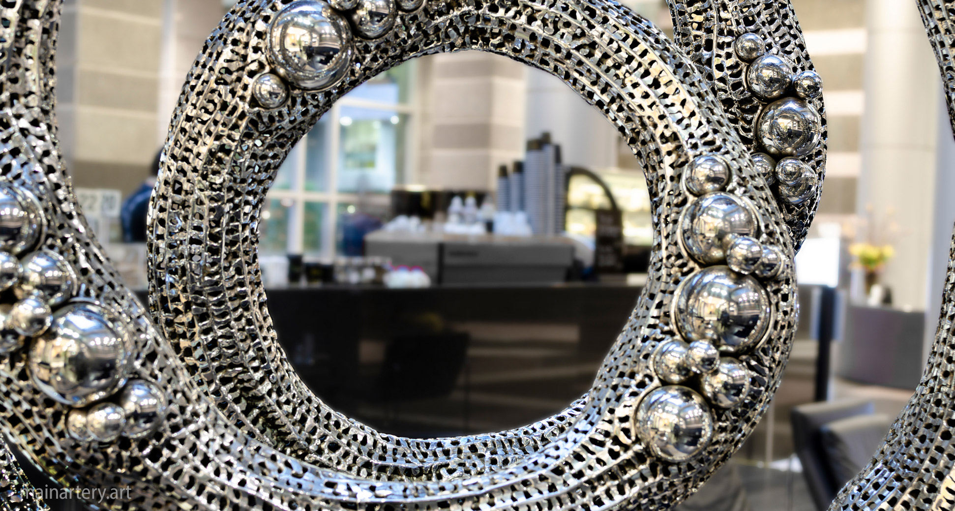 mirror polished organic lobby art image