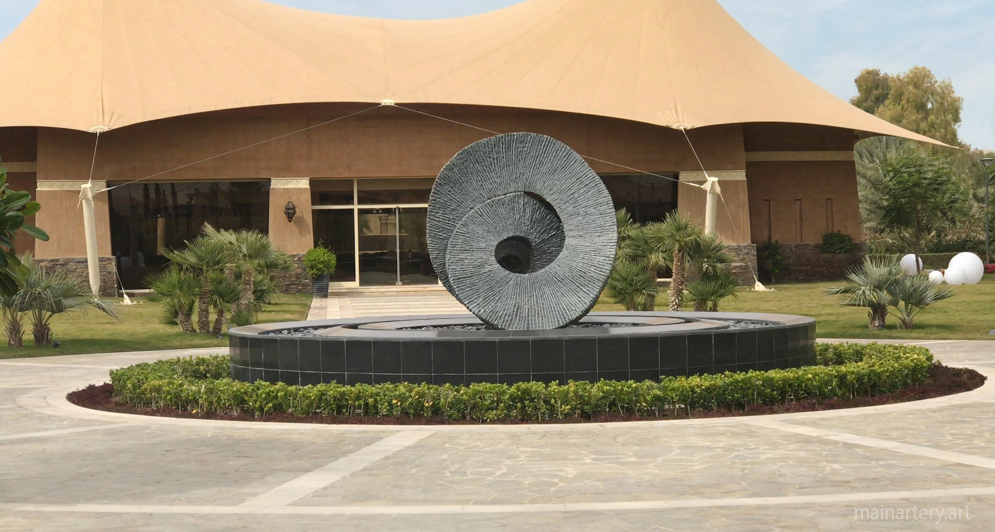 monumental cyclic abstract landscape carved stone sculpture image