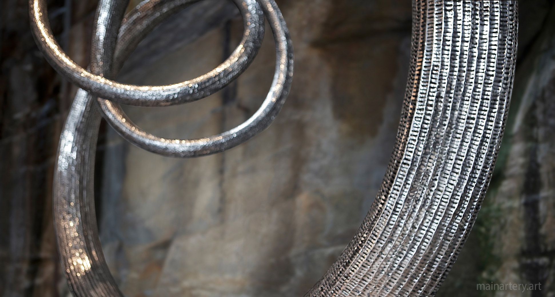 large stainless steel detailed outdoor artwork image