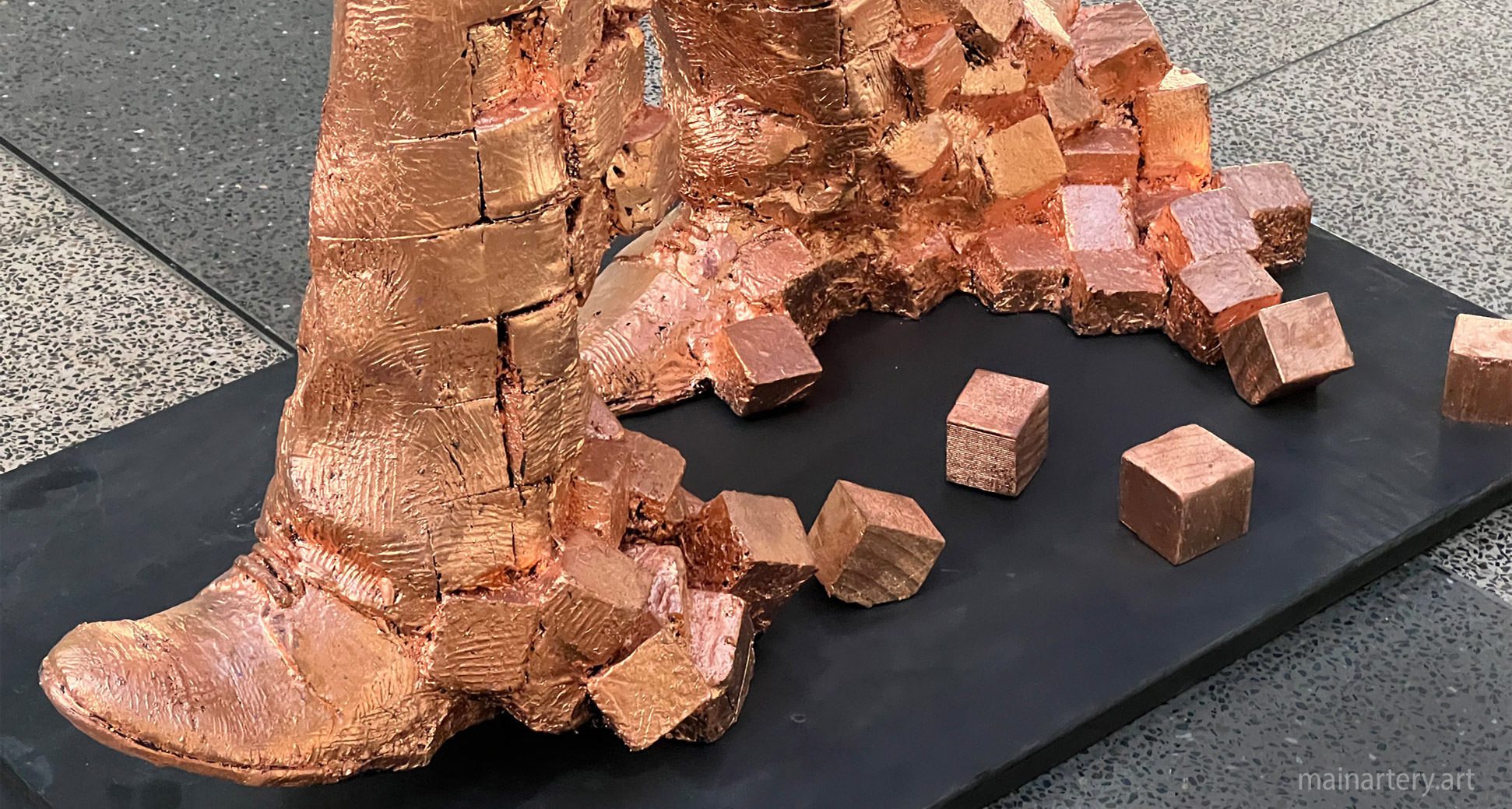 work culture metamorphosis sculpture detail image