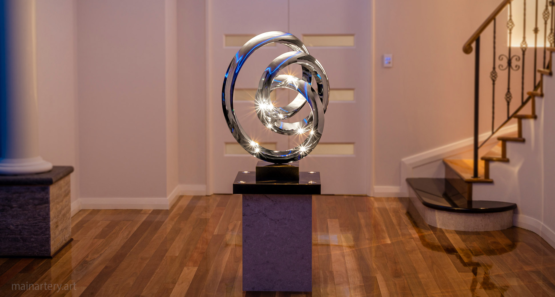 small interior stainless spherical art image